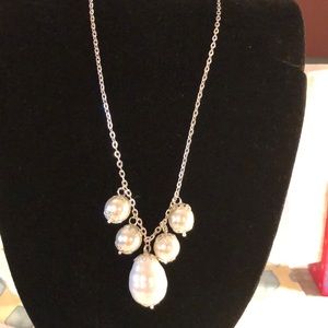 18” shell baroque pearl surrounded by glass pearls